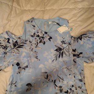 light blue blouse with white flowers